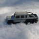Psh, take your puny 4wd and go home. The 6x6 is here to show you how to REALLY drive through the snow.